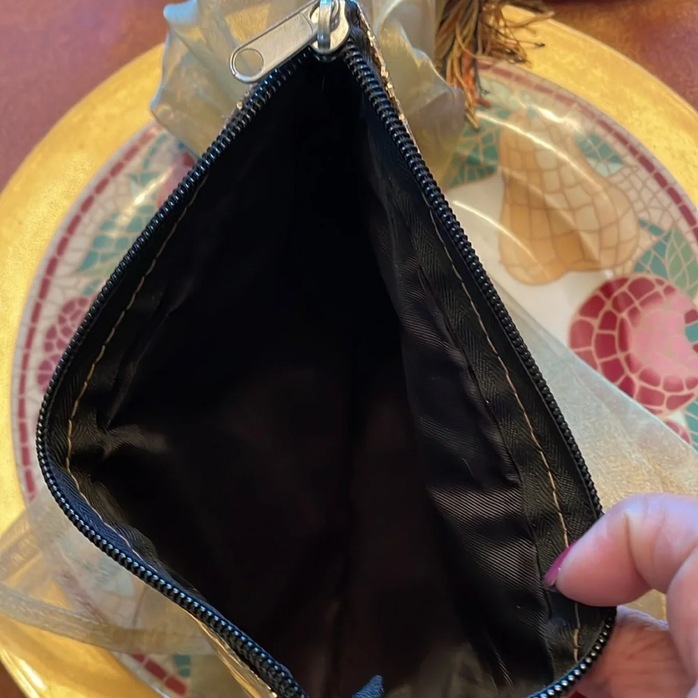 Gold metallic top zip cosmetic or inside purse bag. GUC “Hello Gorgeous”